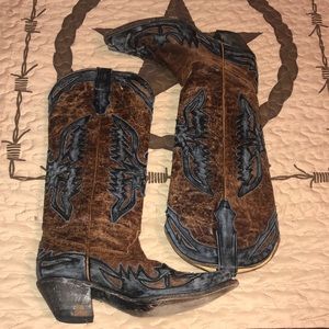 Brown and black distressed boots